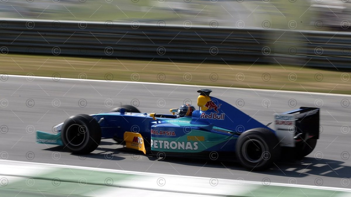 2003_f1's tweet photo. Red Bull was no more than a modest sponsor sticker on the #Sauber C22 of Frentzen (and Heidfeld) during the 2003 #AustrianGP. No-one knew that Red Bull's founder Dietrich Mateschitz - based in Salzburg, Austria - was going to be the buyer &amp; saver of the #A1Ring track in Spielberg https://t.co/uHA0T8vGuJ