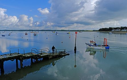 Pretty Felixstowe Ferry posing for perennial local talent, @stephensquirrell. That estuary looks calm as a millpond, but do be aware, its currents are treacherous. Looks like the day's catch is in. #GreatDaysByTheSea #LoveFelixstowe #Felixstowe #FelixstoweSkies #FelixstowePhotos