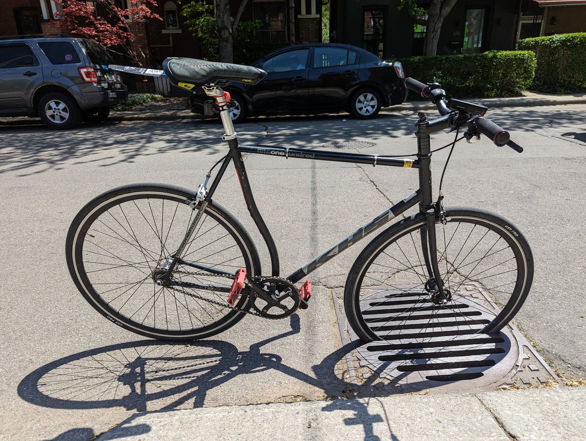 TheBikingLawyer's tweet photo. Sewer grates angled the wrong way are a huge hazard. Had a client whose elbow was seriously fractured as a result. This is on McNabb S of Mulberry @cityofhamilton. These are 28x700c tires, not the slimmest. As cyclists are pushed to the curb by pickups this becomes a real hazard. https://t.co/QFI8ZrKd2w