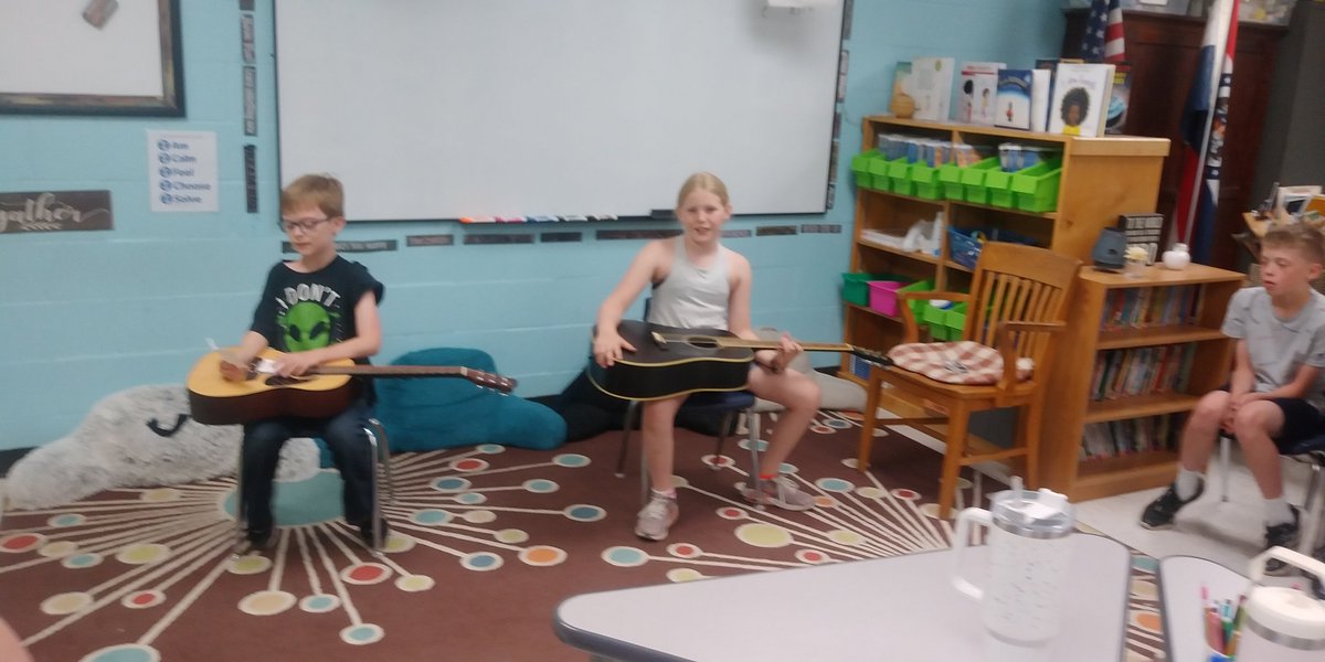 Two students decided to learn how to play the guitar. #Passion projects <a href="/NENbluejays/">Northeast Nodaway</a>