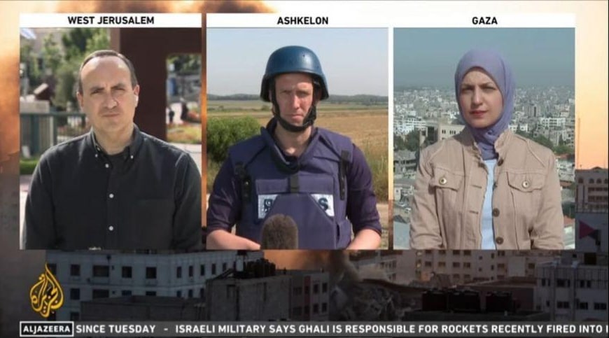YosephHaddad's tweet photo. Leave Al Jazeera's biased reporting and opinions on what’s happening in Israel now…If you look at this picture, you will understand the truth - the journalist who broadcasts from Gaza does not need to wear protective measures because she knows that the IDF will not attack her, on the other hand, the reporter who broadcasts in Ashkelon wears a helmet and a vest...One picture disproves a thousand lies!