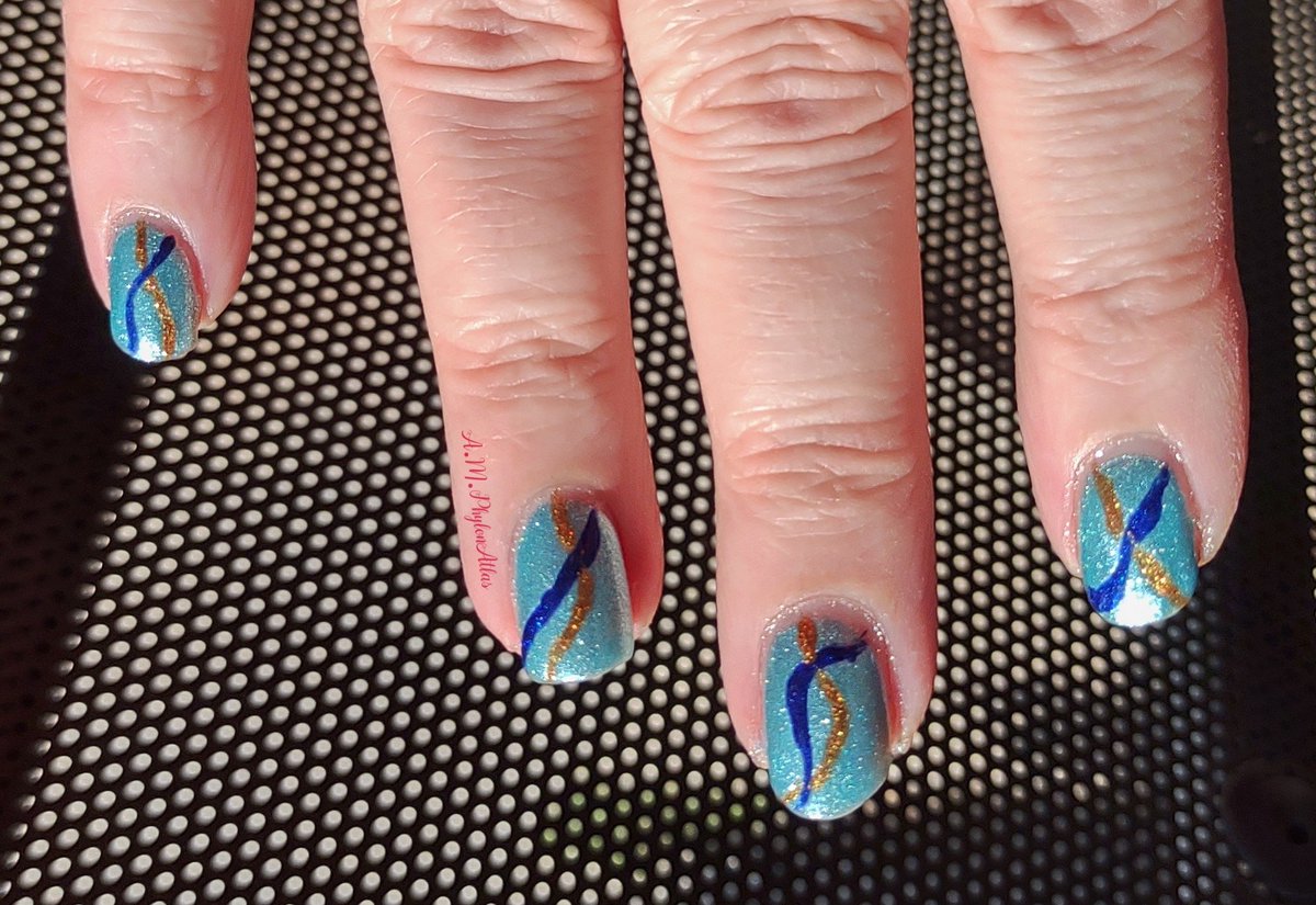 APhylonatlas's tweet photo. Mid-Week-Mani using ORLY'S Written in the Stars as the base and Stripped with ORLY'S In Luck & You're on Sapphire. Base ORLY'S Nail Defense & Cuccio's High Gloss Top Coat. 💙 Love this #naturalnails #nailpolish #manicure #nails #bluenails #shortnails #shinynails #nailinspo https://t.co/VbQrKNsSc9