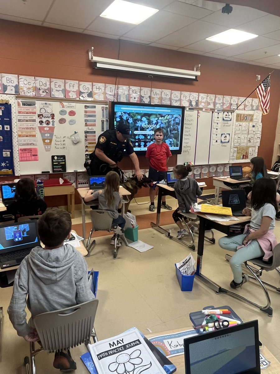 Officer Emch and Cherokee visited GPS today to spread a message of saying no to drugs. <a href="/GenevaSchools1/">@GenevaSchools</a>