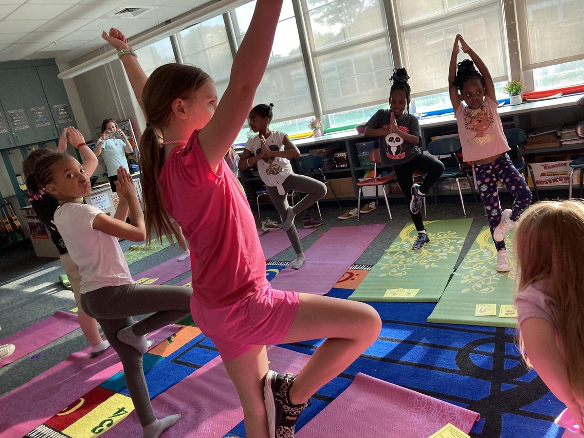 Thanks to @Gaiam & @givebackyoga our Fitness Night @WestParkPlaceES included a #yoga room! It was great to have kids & parents practice together @ChristinaK12 #ChristinaStrong