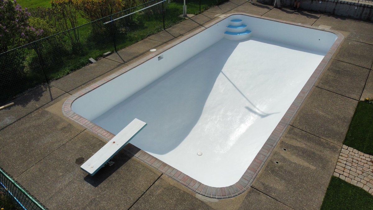 Sandblasted, new troweled walls, and a fresh epoxy seal. Fort Erie, Ontario pools never looked so good!
