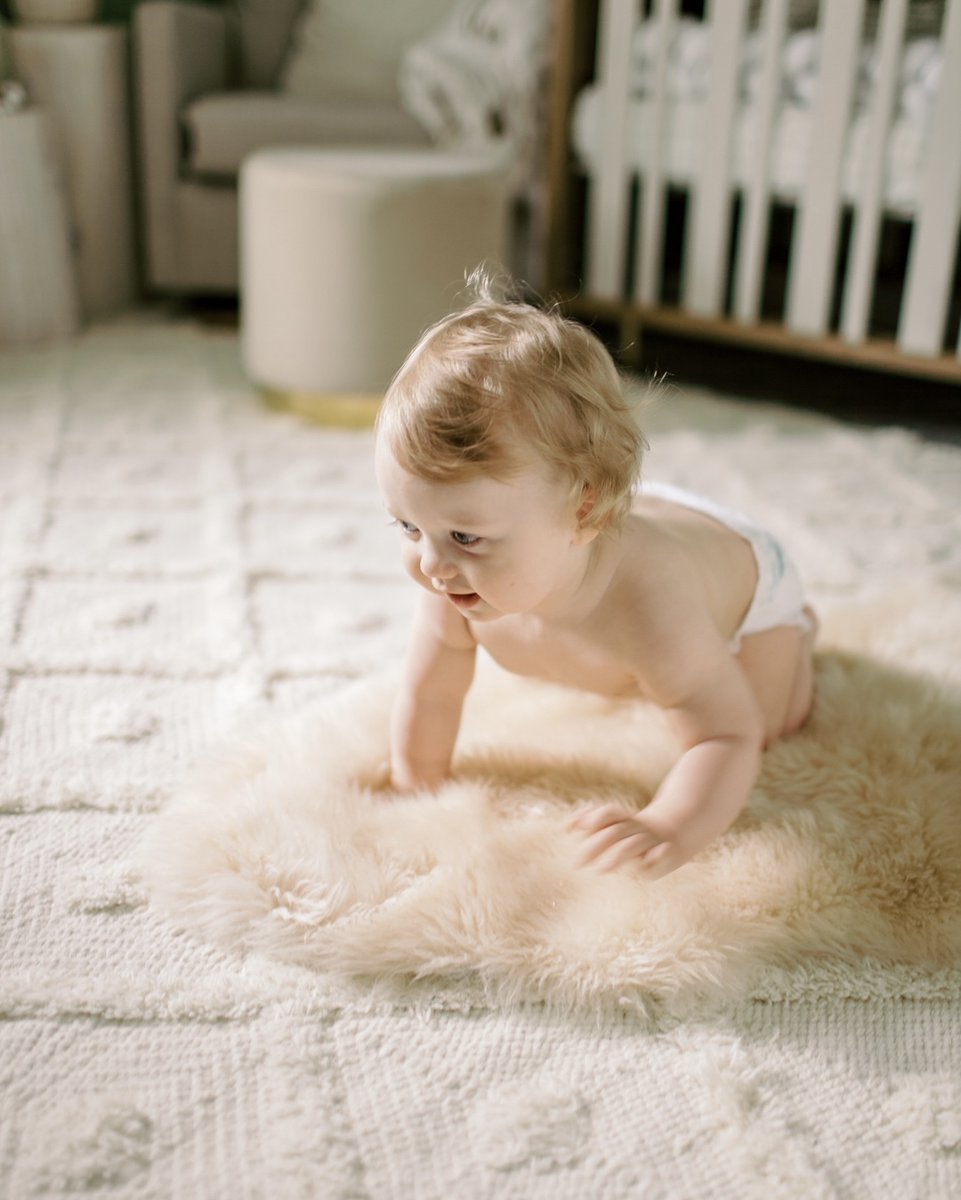 We recently switched out the rug in Bence’s nursery and I’m so glad we did. I love the texture and the style of this Ivory Diamond Textured Trellis Tassel Area Rug from <a href="/rugsusa/">Rugs USA</a>. It’s the perfect addition to his sweet nursery. And most importantly it’s nice and soft and comfortab