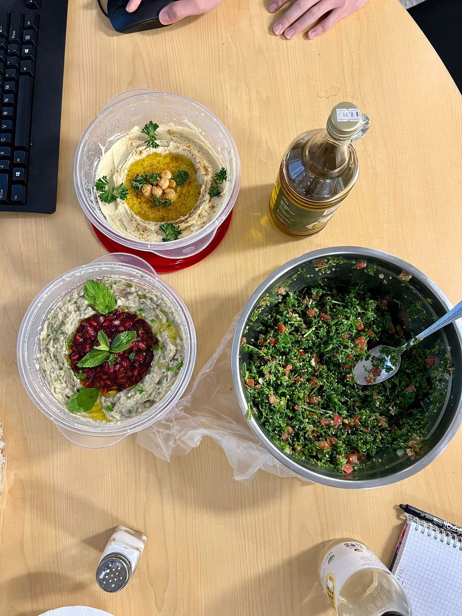 JuliusChapiro's tweet photo. Homemade Hummus, Baba ghanoush and Tabouleh for lab meeting and you know you’re at the @Yale_IR #IOlab meeting. Thanks to @RyanBitar2 we had original Lebanese deliciousness today. #DiversityBenefits #IReats #LifeOfPIs @jomi9601 you’re up next. Bring us some Weisswurst! 🇩🇪🇱🇧 https://t.co/AnMyzQkupt