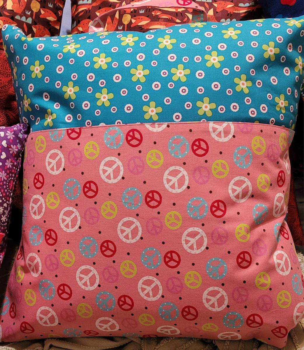 Reading pillows. The pocket holds your favorite book until you your next reading session. They measure 18 inches by 18 inches. They are $25 each.