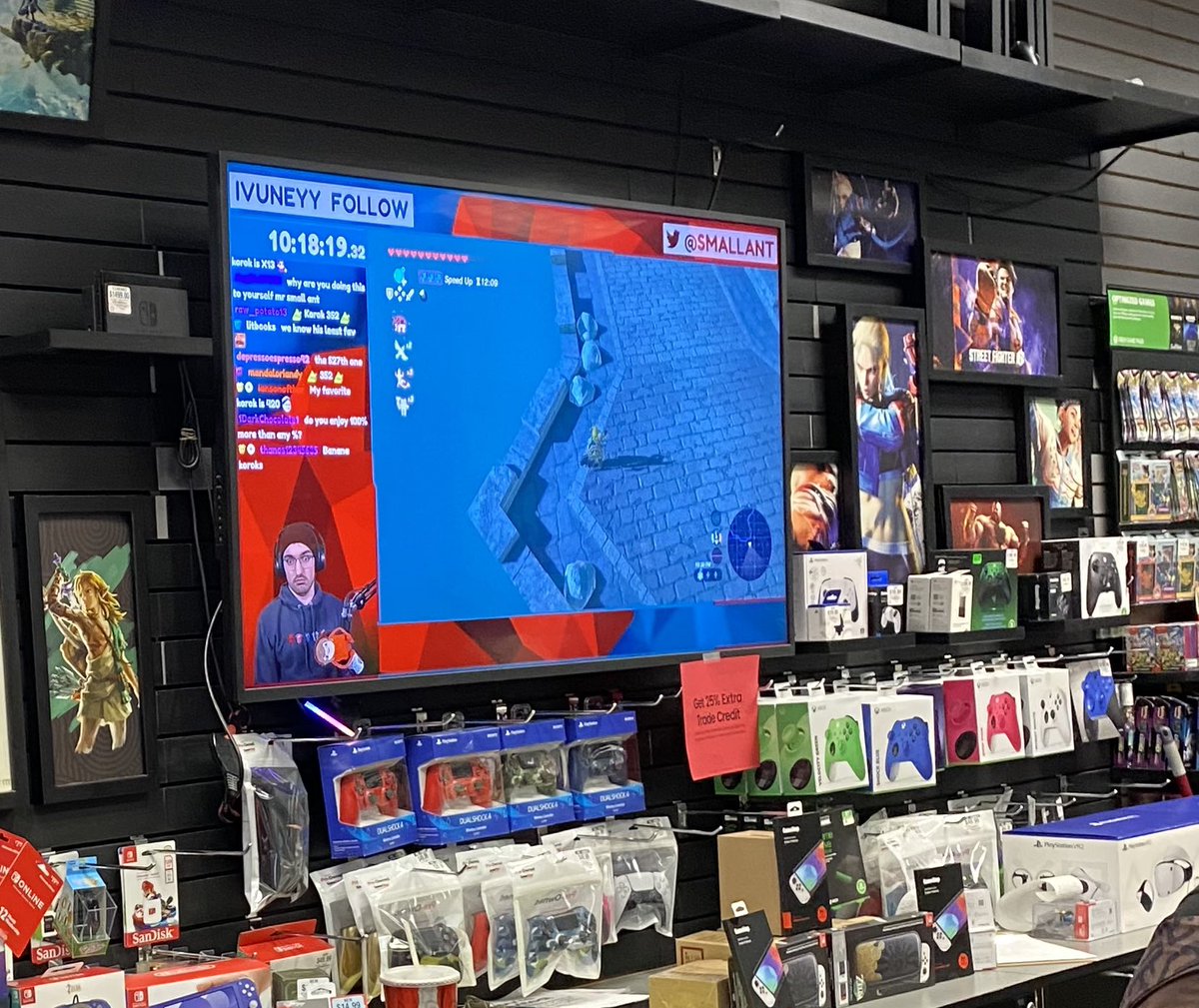 AlanEight's tweet image. My local GameStop playing the @SmallAnt %100 BoTW speedrun at the ToTK midnight release!