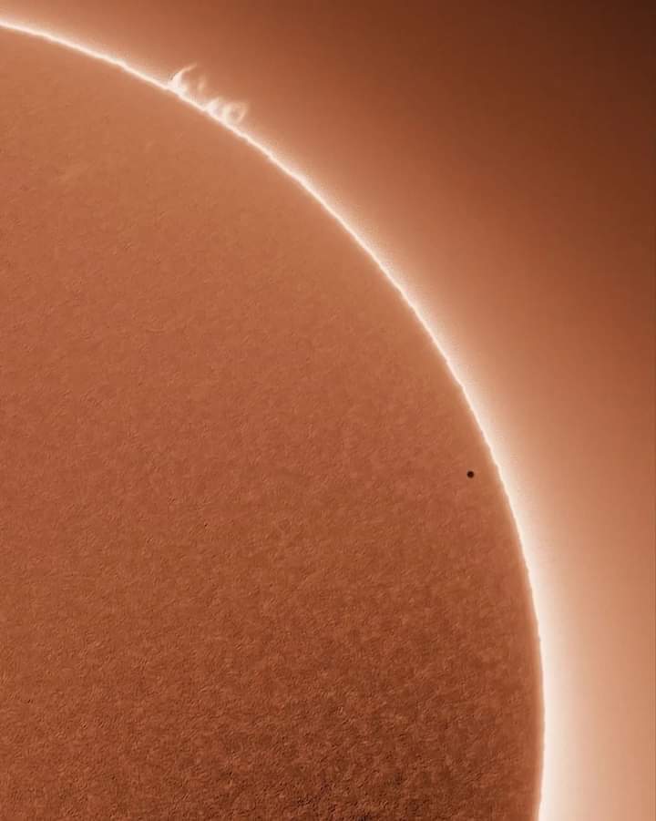 The little dot in front of the sun is actually Mercury