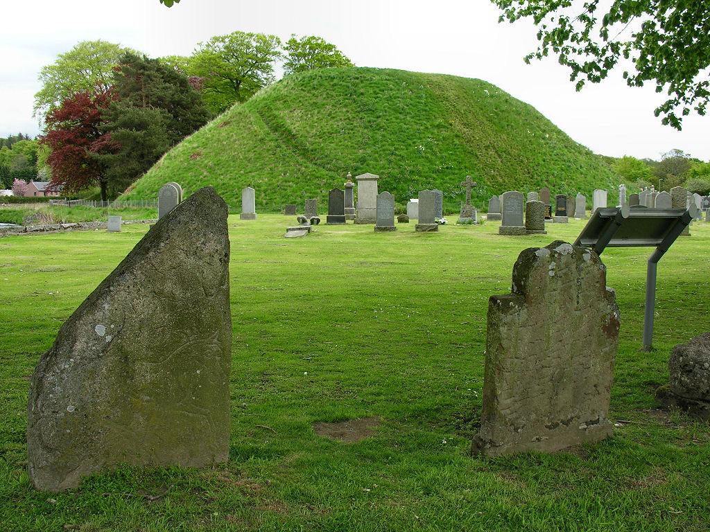 The Bass of Inverurie, standing within a cemetery at the southern end of Inverurie in Aberdeenshire: all that remains of a motte and bailey castle built by the Earls of Garioch in the 1100s and used by Robert the Bruce in May 1308. More pics and info: undiscoveredscotland.co.uk/inverurie/bass…