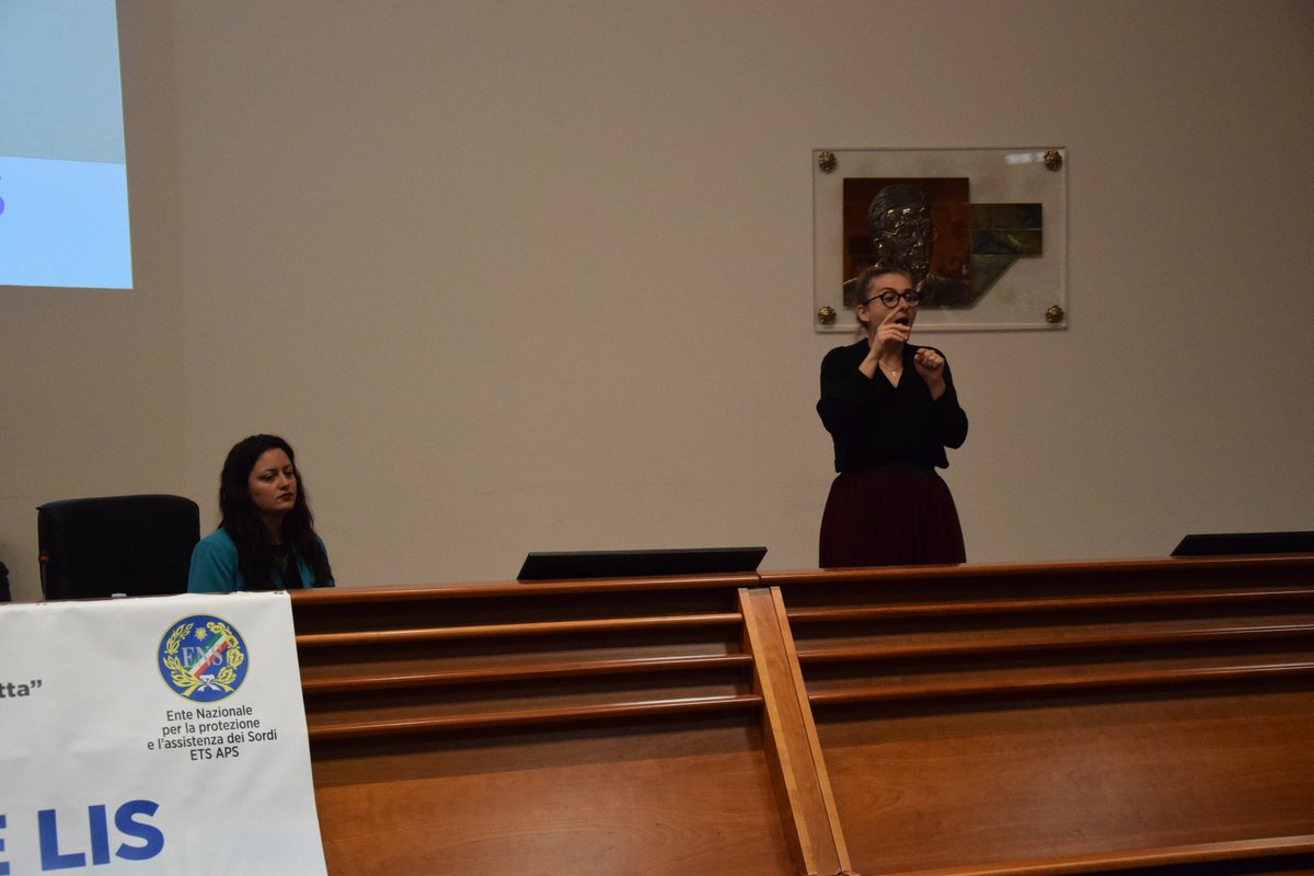 ENS_Italia's tweet image. 🤟#5ConvegnoLIS Susanna Ricci Bitti e Grace Giacubbo de @iltrenoonlus - coop. di persone #sorde e udenti che promuove il #bilinguismo LIS/italiano - ci introducono ad un nuovo genere testuale in #LIS, le FiLIStrocche per #bambini sordi.

📄Il programma: ens.it/wp-content/upl…