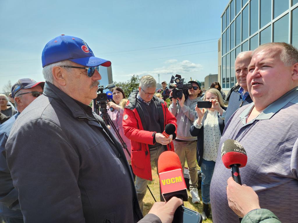 RDugganVOCM's tweet photo. Protesting crab harvesters made their way to the Ocean Choice International offices on Topsail Road this morning. They had the ear of OCI leadership for over an hour @VOCMNEWS https://t.co/Eu6xXEYBUA