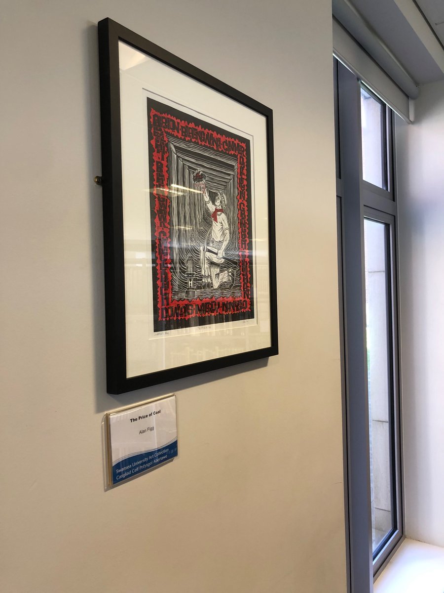 RAVatwork's tweet photo. Fab to see thought-provoking works from #SwanseaUniversityArtCollection (Alan Figg’s #ThePriceOfCoal here) reflecting #BayLibrary’s history and location, as well as the subjects we support, arranged by @SwanseaUniLibrary colleagues and students as part of our #UX programme https://t.co/jVk8C77DbV