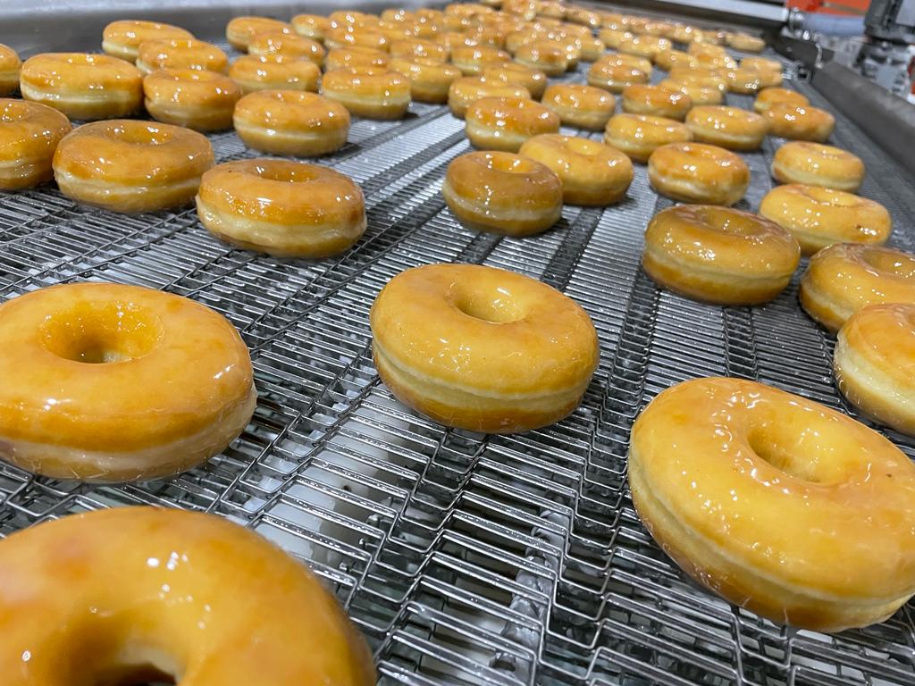 At Topos Mondial Corp, we know that making the perfect doughnut requires precision. That's why our equipment is designed to deliver consistent results every time. #precisiondoughnuts #commercialbakeryequipment