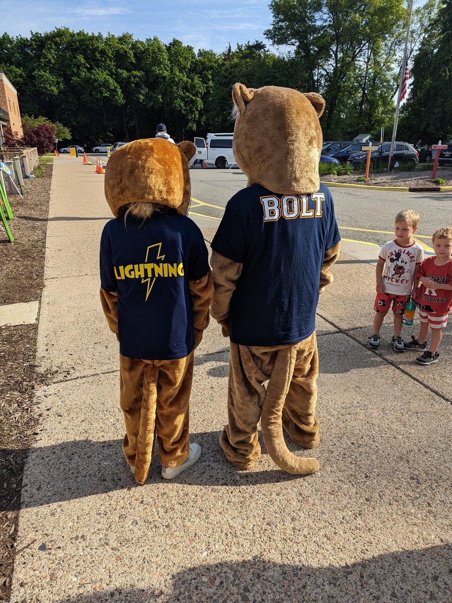 Today the HSA unveiled NB's mini mascot, Lightning! Both Lightning and Bolt greeted students as they entered school this morning. #peqpantherpride