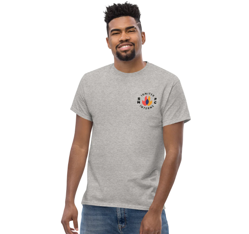 StFrancisBmore's tweet photo. Now introducing the 2022-2023 Igniter Internship t-shirt, ON SALE NOW through our online merch store! The #IgniterInterns hand-picked this slogan for the program &amp; one of the interns, Chaela, designed "Iggy" the flaming mascot! 🔥 Get yours: https://t.co/ugreuSfxD3 https://t.co/WIPmtRHb2C