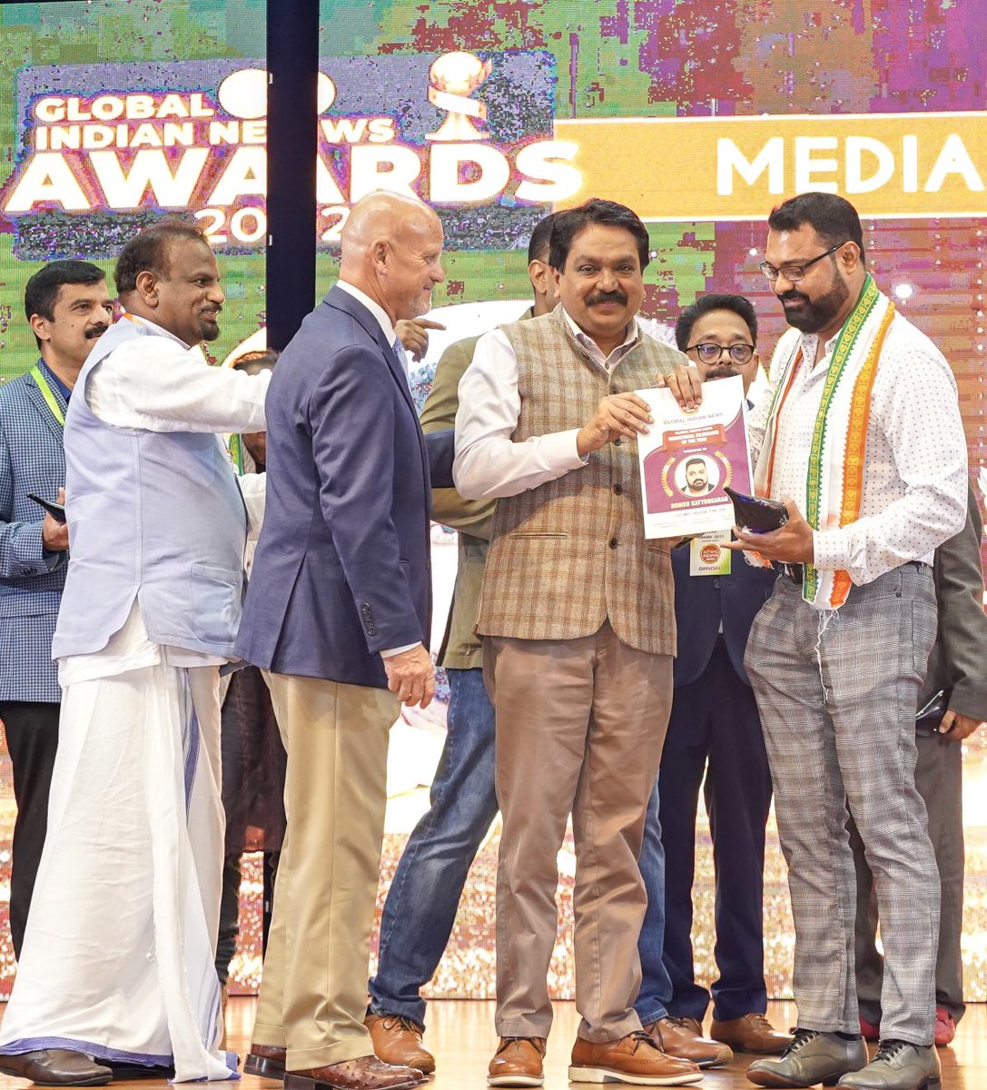 RKattookaran's tweet photo. Sharing this incredible moment with you all - receiving the “Sensational Filmmaker of the Year” award by Globalindia Newsportal 

Grateful for the recognition and Thankful to  @Tomin J Thachankary DGP of Kerala Police, Mayor Kevin Cole of Pearland City, and  Brian M. Middleton. https://t.co/V3xImWoZrf