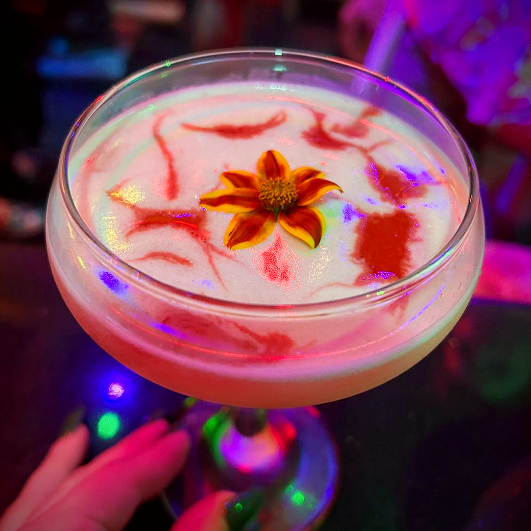 Look at this beaut! 

The Royal Hawaiian strikes an elegant balance of gin, pineapple, lemon, and orgeat, garnished with streaks of bitters &amp; a flower. 

Treat yourself to paradise this weekend!

Reservations strongly recommended Thurs-Sat at forbiddencovesd.com.