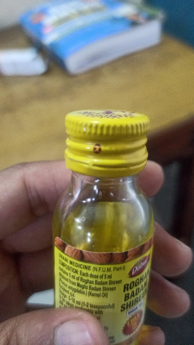 P00Naik's tweet photo. Bought Dabur Almond oil and realised that there is mosquito in this sealed bottle. @DaburIndia can you explain this? @jagograhakjago @MOFPI_GOI @forum_consumer #dabur https://t.co/e6tVNFL411