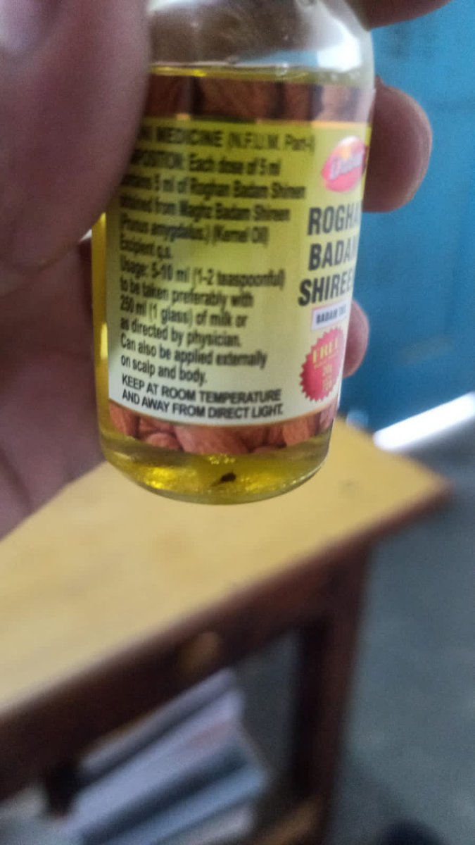 P00Naik's tweet photo. Bought Dabur Almond oil and realised that there is mosquito in this sealed bottle. @DaburIndia can you explain this? @jagograhakjago @MOFPI_GOI @forum_consumer #dabur https://t.co/e6tVNFL411