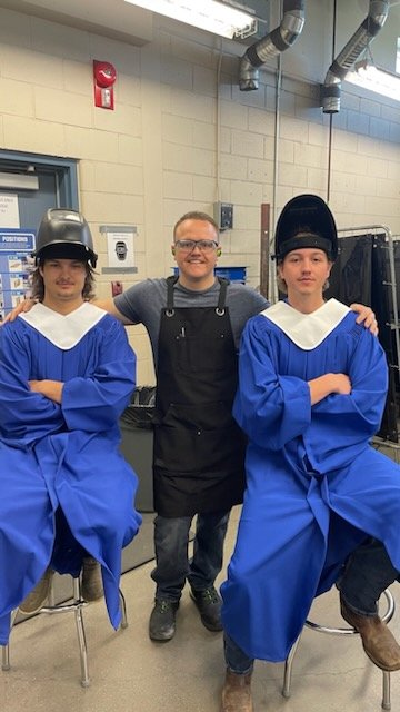 Lance_Rosen's tweet photo. Day absolutely made! It's @cchschool Grad weekend, and these gents came by in their gowns to get a picture with me in the welding shop. I am so proud of these guys and all of our graduates. I'm a lucky teacher!
#hs4 #ilovemyjob @HolySpiritRCSD https://t.co/9Pw2KF7FAG