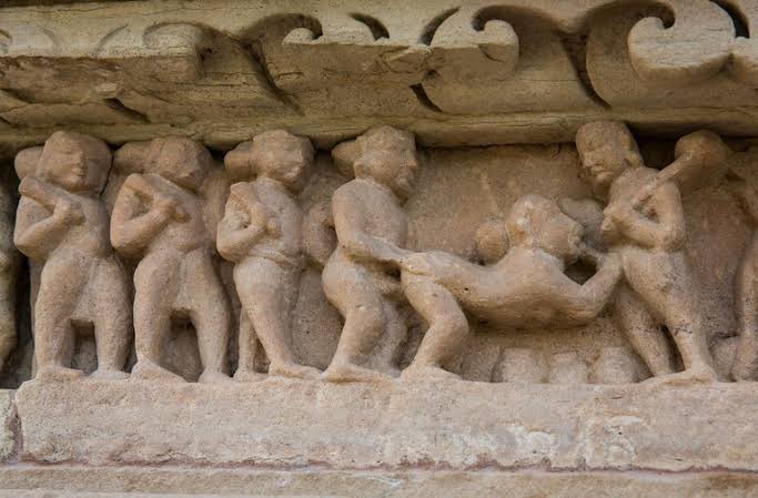 DrDatta01's tweet photo. Raas leela of Lord Krishna where he was having sex with at least 108 women. That didn’t come from the “west”. 
And where exactly was kamasutra written? The temple of Kharuraho? So a couple can’t sit together is suddenly a problem? Besides India has already crossed China in population growth. How did that happen? Without sex? 😏
Don’t blame the west for you being a dimwit.