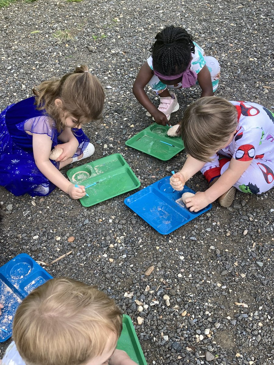 ICSEagles's tweet photo. Dino Day! PK has been learning about dinosaurs through fossils &amp; poetry. Our budding paleontologists spent the morning at our on-campus archeological dig site, excavating Dino eggs, creating a Dino fun fact display, and examining real fossils under the microscope.  🦕🦖 #icsstem https://t.co/NygmsOo9Hp