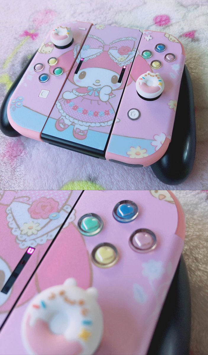 I gave my switch a makeover a while back :) complete with pink player lights and heart buttons 🫶🎀 (custom joycons are by @GameTraderZero!)