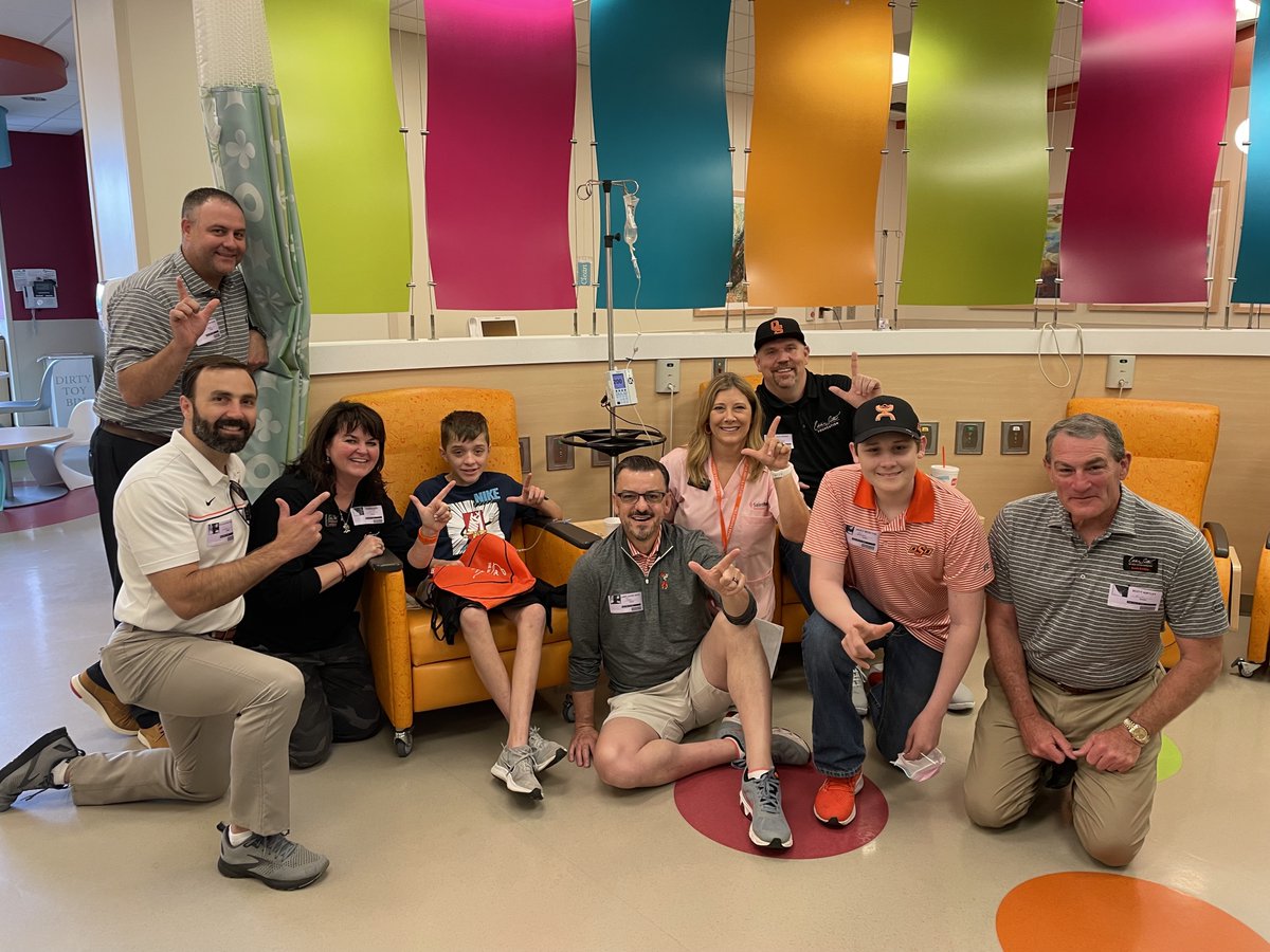 osucvc's tweet photo. This morning, Board Members from the Eddie Sutton Foundation visited our partners at the Bucky Golf Tourney and then finished up with a visit to St. Francis Children's Hospital.  Always an honor to spend time with cancer kickin' kiddos.

#okstate #kickcancer #cowboysvscancer https://t.co/uWyEGoFDCB