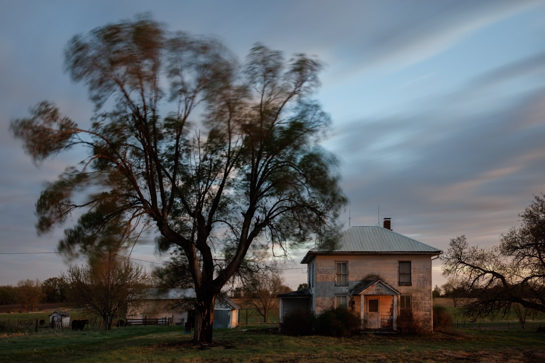 Abandoned home on Belt Road in Linn County, Missouri. Photography by Notley Hawkins. #missouri #house #home #abandoned #abandonedhome #forsaken #entropy #rural #windyday #highwinds #passingclouds #partlycloudy #outdoors #wideangle #longexposure #haida #haidafilter #neutraldensity
