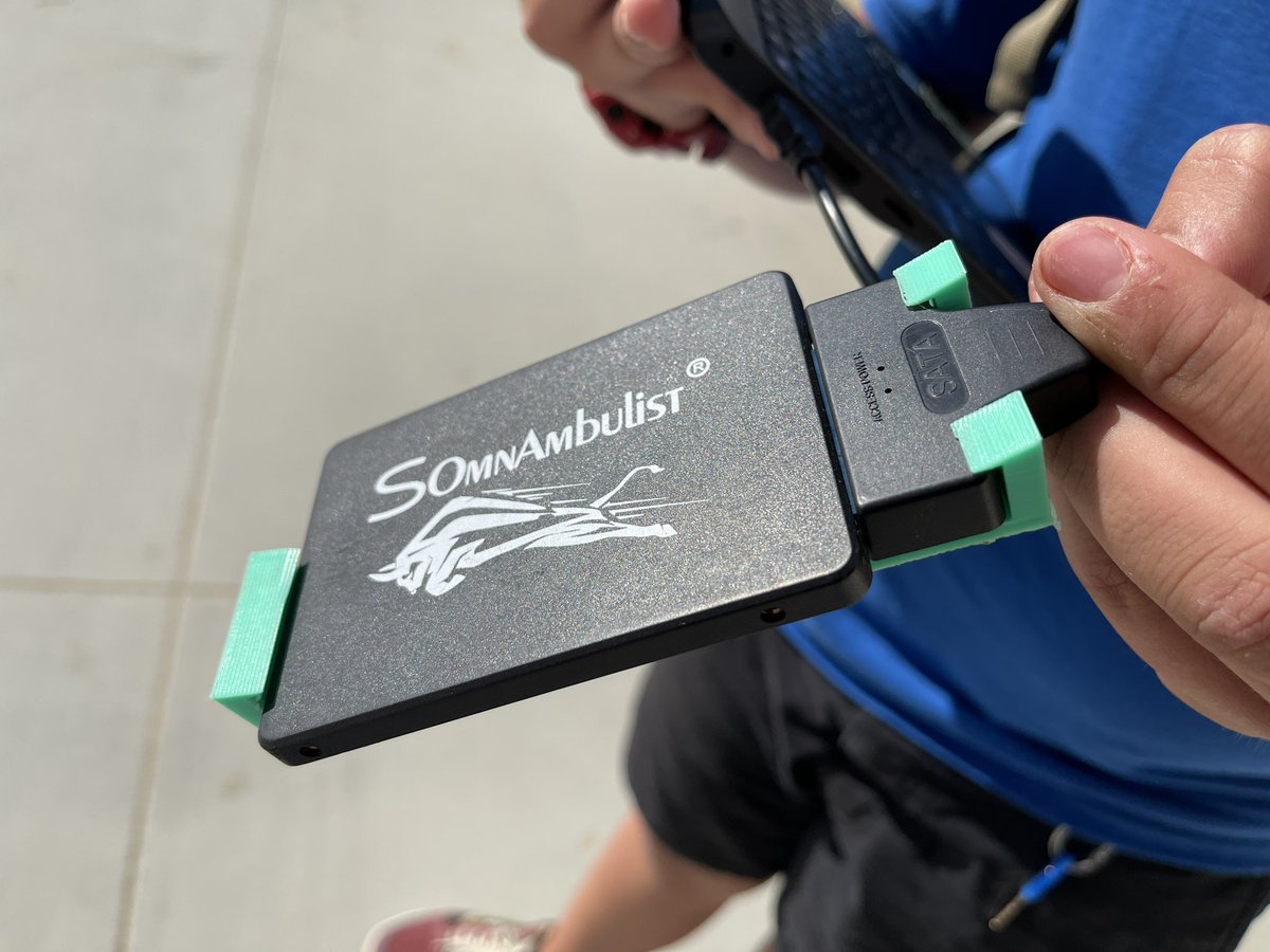 EternalNewsNow's tweet photo. My student designed and printed a solution to his external drive and cable disconnecting.  He got it right on the first iteration.  Proud moment. #3dmodeling #3DPrinting #DesertRidgeAcademy #DSEF #DSUSD #edtech #Makerclassroom #SpringCUE #Tinkercad #STEMeducation #teacher #proud https://t.co/ZbxSDvnP28