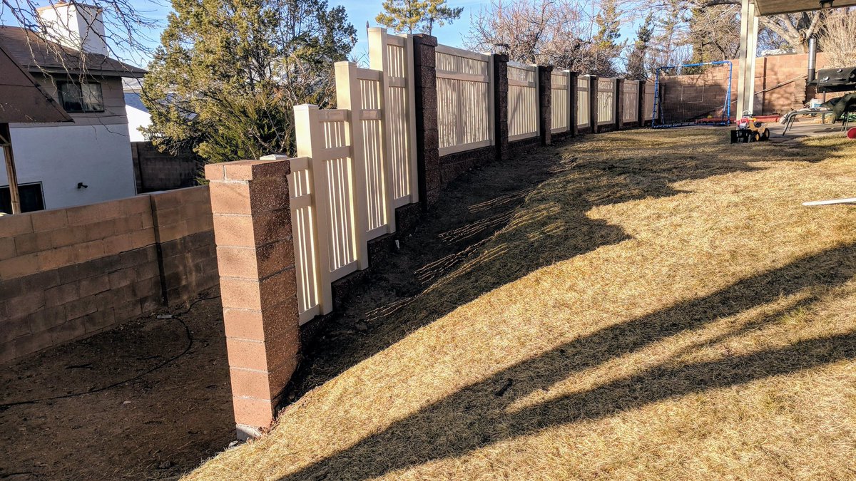 Custom semi privacy picket in our almond color. Custom step down fencing. Custom sections in-between pilasters. #custom #customfencing #vinyl #vinylfencing #NewMexico #abq #supportlocal