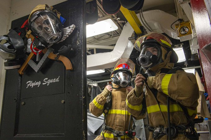 Suiting up! ⚓ 📷 #NavyReadiness #Sailors prepare for a damage control training team drill aboard the guided-missile destroyer #USSPaulHamilton (DDG 60)] in the Gulf of Oman.