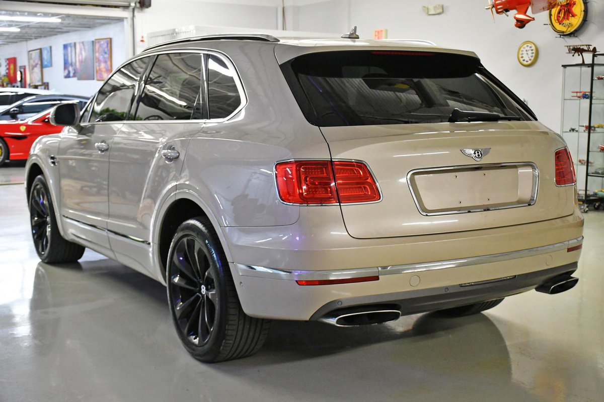 McAutomotive_'s tweet photo. Check out this stunning 2017 Bentley Bentayga! With its powerful engine, luxurious interior, and sleek design, this SUV is sure to turn heads. Don't miss your chance to own a piece of automotive excellence. Contact us today to schedule a test drive! #Bentley #Bentayga #LuxurySUV https://t.co/iFjRqFXDLF