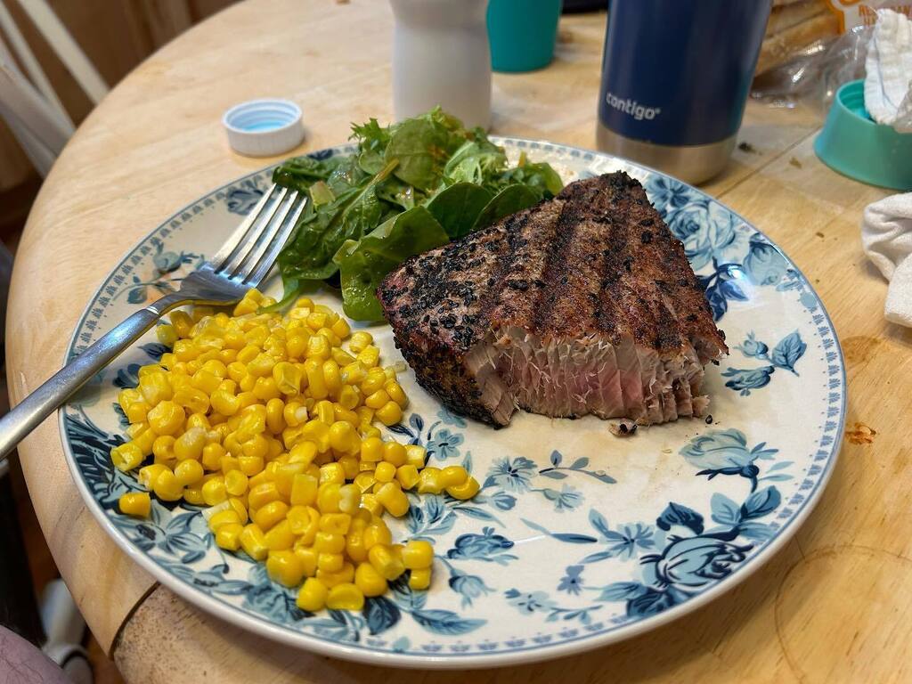 JREDesigns's tweet photo. Might have been an impulse buy, but tuna steak on a charcoal grill is hard to beat. Overcooked to be sure, but in a landlocked state, I’d rather overcooked fish then suffer from bad food. @mountainsandmayhem11 how about we have the best tuna salad with o… https://t.co/iDNob8uiDz https://t.co/ljZwzPBgIr