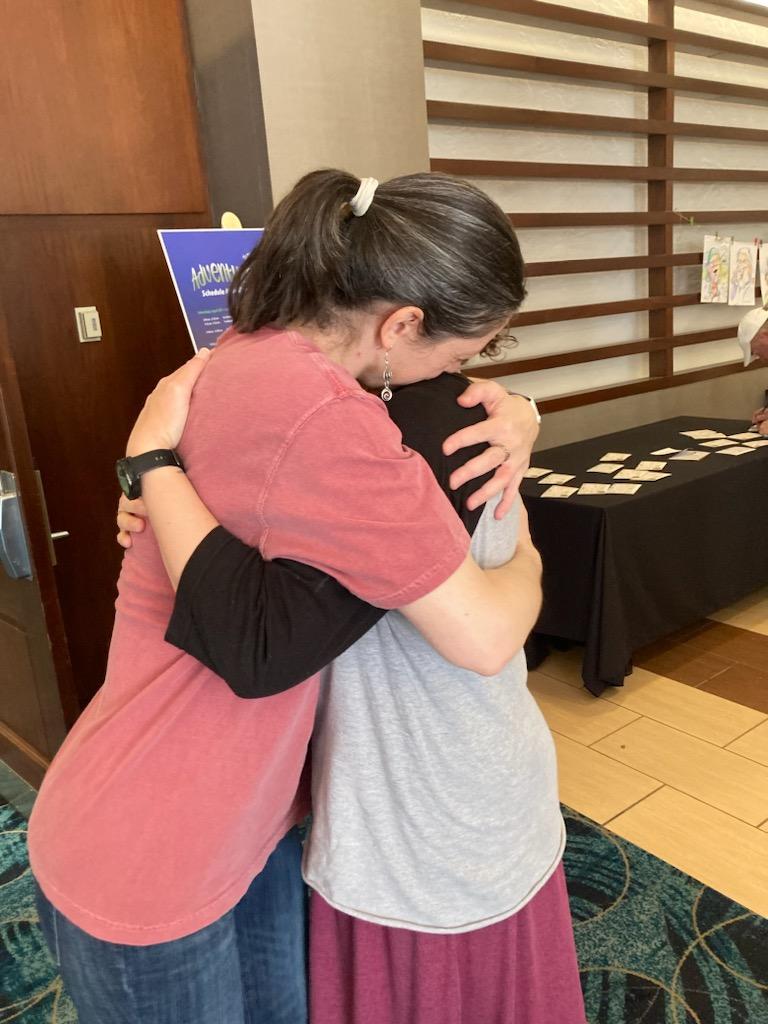PsychNerdV's tweet photo. One last round of hugs with my amazing scholarship donor (Dr. Olga Karasik) before heading home, full of happy endorphins and exploding with ideas. Can’t wait for next year! 🥰😍🤓
#HumorConference #HealingWithHumor #PositivePsychology https://t.co/zWwYYjQPHY