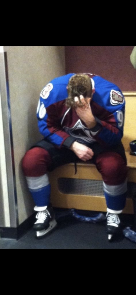 DMacSportsCO's tweet photo. This photo is from 9 years ago today. I will never forget it. The Avs blew 4 leads to lose in 7 games to the Wild. Ryan O’Reilly was devastated. This photo was taken long after the game was over. He couldn’t move because he was so devastated. Unforgettable moment. The last time the Avs played a G7 home game.
