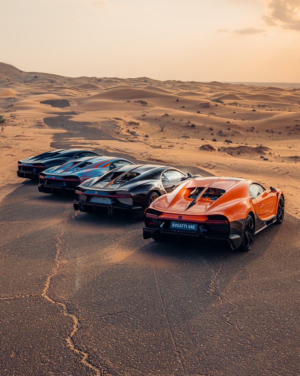 Bugatti's tweet photo. Four special CHIRON Super Sport created upon the request of their owners. One Dubai desert. And a unique experience that will last a lifetime. This is a celebration of BUGATTI’s automotive products, customization and craftsmanship.

#BUGATTISurMesure
–
https://t.co/mCEE0ghyaw https://t.co/JfJT9EbWjj