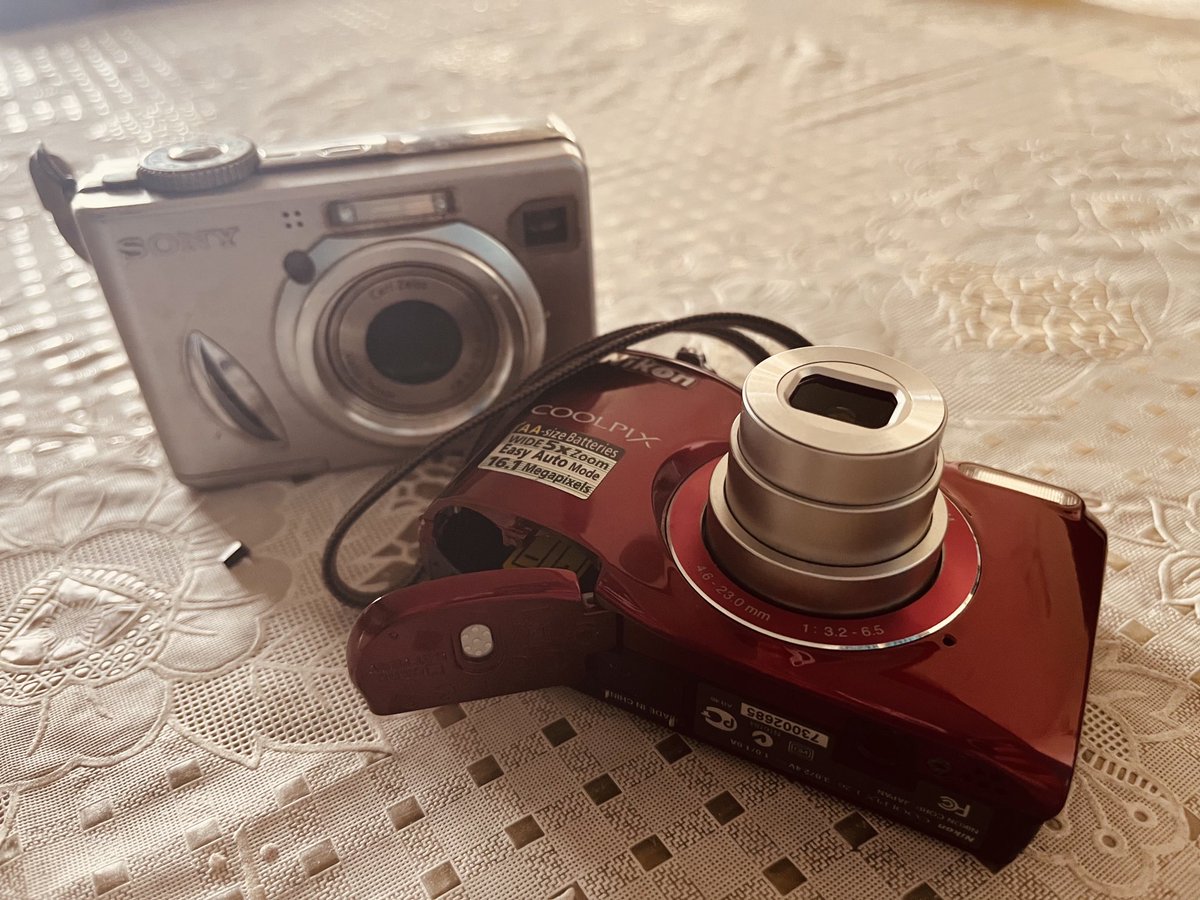 Finding some proper dinosaurs while cleaning. The Nikon still works with the first click, but the Sony was a goner even back in the day. The Eneloop Pros still holding charge over 10 years (or more maybe.) #ewaste