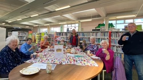 PortyLibrary's tweet photo. Our #LibraryLink got some pre-emptive #Coronation celebrating done this morning, so they had their usual lively chin-wag, they scoffed a load of festive scran and drank enough tea to float the Royal Yacht! 👑🍰🫖☕️❤️🤍💙🇬🇧 https://t.co/wmPeupGsB2
