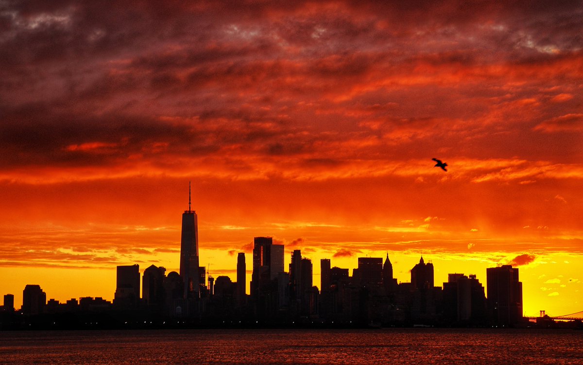 GaryHershorn's tweet photo. After three days of rain, a colorful sunrise to begin the month of May in New York City, Monday morning #nyc 
#newyorkcity #newyork #sunrise @agreatbigcity https://t.co/ZVQYSAqWfc