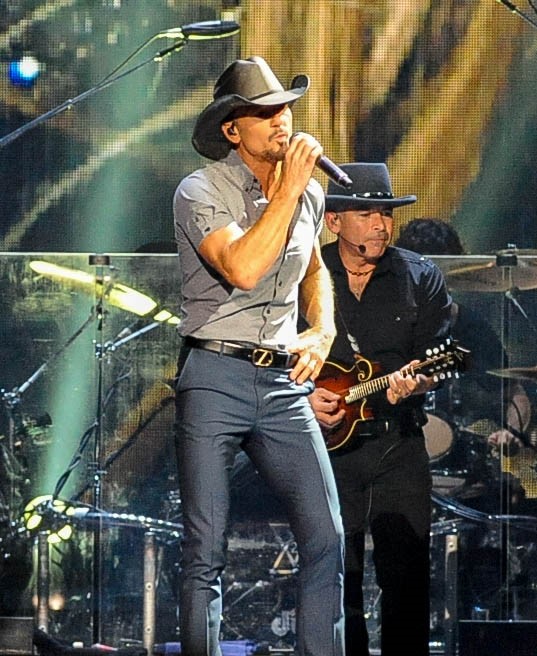 56 and still looking great!!! Happy Birthday ! What\s your favorite Tim McGraw song? 