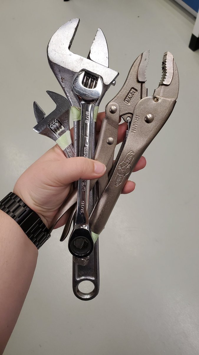 LivWithoutLimit's tweet photo. My tools of the day include a really big wrench! I'm tightening up an ammonia gas line to remove leaks so I can make some ~*~science~*~ happen. #TodayInLab https://t.co/LqvMsgApne