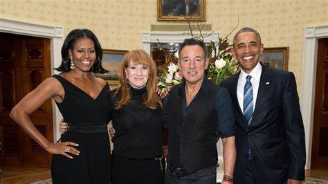 donkoclock's tweet photo. OVER THE WEEKEND - The Obamas hanging with Bruce &amp; Patti in Barcelona! 

Michelle even made an appearance on stage with the Boss during Glory Days! 

Drop a Heart 💙 if this makes the New Month a little brighter &amp; please share ♻️ with your friends!

#MondayMotivation #VoteBlue24 https://t.co/0phrvIOwtj