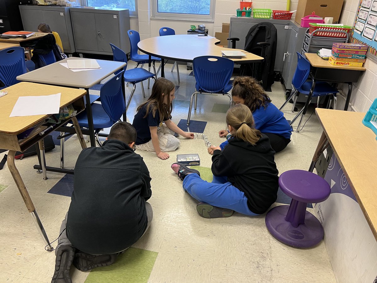 Demonstrating how particles collide with some dominoes #oakridgemustangs