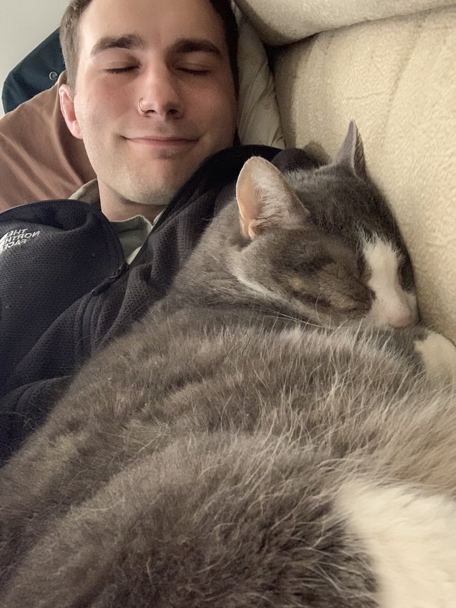 JaredBoon's tweet photo. Most content when cuddled up with my cat https://t.co/sWRjL5MEni