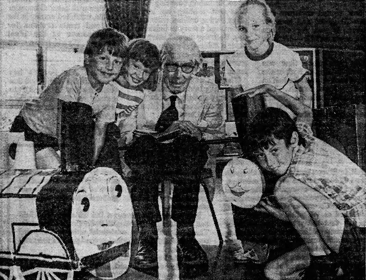 Reverend Wilbert Awdry makes a visit to the Coney Hill Junior School in Gloucestershire to see some of the models the pupils made of his characters.

The Citizen, 21 June 1986