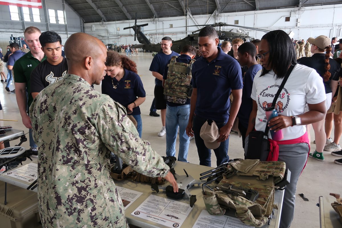 USSOCOM's tweet image. #JROTC cadets from @HillsboroughSch and area colleges participated in Military Career Day at @MacDill_AFB, Florida, on April 28. Students took a tour featuring static displays, exhibits, and demonstrations of USSOCOM capabilities, base missions support, and MacDill's aircraft.