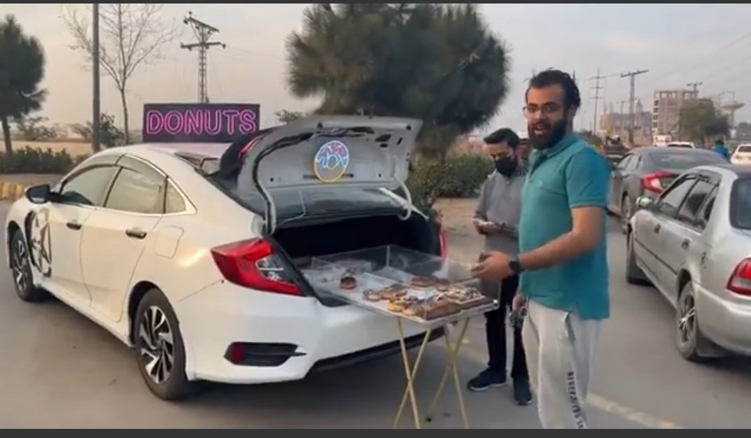 bleedgreenarmy's tweet photo. Pakistani Entrepreneur/Engineer Selling 'Donuts' on Honda Civic in Lahore. https://t.co/I22YquD684